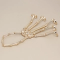 Bracciale a mano scheletro punk oro con anelli per dita e catena da polso per costume Halloween - Oro