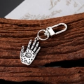 Vintage Hamsa Hand keychain in antique silver alloy with Evil Eye and cosmic symbols - Hamsa Hand Style