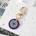 Portachiavi occhio greco con placcatura in oro e strass blu brillanti per borse - Base Oro Zirconia Blu Reale