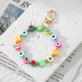 Handmade Evil Eye fruit beaded keychain with colorful summer charms and golden lobster clasp - Fruit String
