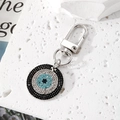 Dettaglio del ciondolo malocchio con strass scintillanti e moschettone in metallo argento - Argento/Zirconia Nera