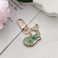 Kreativer Delphin-Anhänger aus Harz mit blauen Trockenblumen und goldenem Metallrahmen - Blaue Blume Delfin (Ohne Perle)