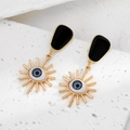 Pendientes vintage ojo turco con esmalte negro y colgantes de ojos azules - Ojo de Sol con Borde Dorado