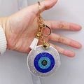 Llavero de ojo turco azul con diamantes de imitación y flecos de cuero blanco - Oro Blanco Azul