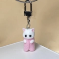 Detail of cute flocked kitten keychain with pink felt body and silver metal spring clasp - Pink