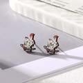 Detail view of Halloween ghost on skateboard wooden stud earring with cute red hat motif - Skateboard Ghost
