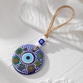Detailed macro of large blue acrylic Evil Eye pendant with colorful dots and jute rope - Colored Dot Texture Eye(33#)