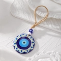 Detail of blue evil eye acrylic pendant with tribal patterns and natural jute rope - Yellow Blue Radiant Eye(6#)