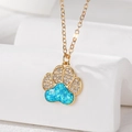Elegant gold-plated opal necklace featuring a blue paw print pendant with white zircon accents - Blue Paw