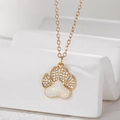 Close-up of gold cat paw necklace with white zircon and iridescent opal inlay details - Paw Print (Stainless Steel Chain) / White Bear Paw
