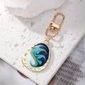 Llavero bohemio de gota con esmalte fluido azul y dorado, con cierre de langosta de aleación - Cian