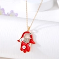 Detailed close-up of a Hamsa hand pendant with red enamel, evil eye, and clear rhinestones - Red Hollow Hand