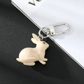 Cute 3D resin bunny keychain in creamy white with silver metal carabiner clip - Off-white Rabbit