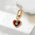 Roter Herz-Schlüsselanhänger mit bösem Blick, Goldbeschichtung und Kristallen - Rote Emaille Herz Stil / Gold Rot Strass Herz