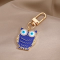 Llavero de búho vintage con esmalte azul de ojo y pedrería brillante para accesorios - Búho Dorado