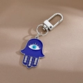 Détails du porte-clés main de Fatma avec pendentif œil bleu et cristaux brillants - Main Bleu Foncé / Argent