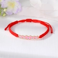 Handmade red braided cord bracelet with pink butterfly and evil eye charms for good luck - Pink Butterfly