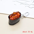 Detail of creative resin sushi keychain featuring ikura gunkan and weight info 23.4g - Fish Roe Sushi