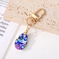 Llavero de ojo turco en cristal azul con colgante de gota y cierre dorado - Gota de agua