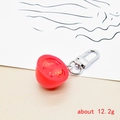 Detailed macro view of realistic 12.2g cherry tomato keychain with silver metal clasp - Bottom Half Tomato