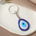 Waterdruppel boze oog sleutelhanger met blauwe hars hanger en zilveren ring - Waterdruppel Koningsblauw