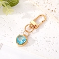 Detail of light blue heart crystal keychain with golden claw setting and spring clasp - 5# Light Blue Crystal Heart