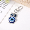 Silberner Eulen-Schlüsselanhänger mit blauen Nazar-Augen aus Emaille und D-Ring-Verschluss - Silberne Eule
