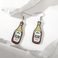 Macro detail of wood rum bottle earrings on a stone texture background - Rum Bottle Style