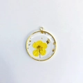Artisan resin necklace with dried yellow flower and gold flakes in a circular pendant - December Yellow Narcissus Pendant Only (Without Chain)