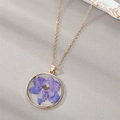 Golden round pendant necklace with purple dried flower and delicate gold chain - July Violet (Necklace)