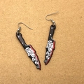 Detailed shot of Gothic cleaver earrings with floral print and red blood edge details - 7# Three Flowers Pointed Knife (D339E)