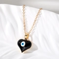 Collar de cadena dorada con colgante de corazón negro y motivo místico del ojo turco - Negro