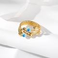 Golden multi-layer spiral ring with blue evil eye beads and textured diamond patterns - White Eye