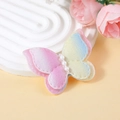 Detail of gradient butterfly bow with glitter sequins and three white pearl accents - Pink Yellow Blue Gradient Style (#1)
