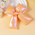 Bright orange metallic fabric stuffed bow DIY accessory with holographic laser finish - Bright Orange Iridescent