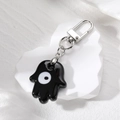 Portachiavi Mano di Fatima nero con pendente occhio di Allah e chiusura in argento - Nero