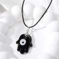Retro black Hamsa hand necklace with glass Evil Eye charm on black cord strap - Black Glass Hamsa Hand