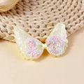 Glittery angel wing hair accessory in pale yellow with a satin bow center detail - Light Yellow