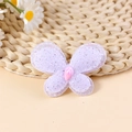 Light purple macaron butterfly hair accessory with silver glitter and pink gem detail - Purple