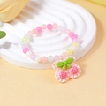 Pulsera de cuentas macaron con colgante de cereza rosa y lazo verde para niñas - Colgante de Cereza (#3)