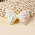 Nœud pailleté pastel avec sequins rose jaune vert sur un fond tissé artisanalement - Dégradé (#6)