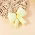 Puffy swallowtail bow accessory in pale yellow fabric with soft cotton filling - Yellow (FJ501)