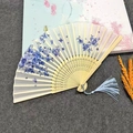 Classic Chinese folding fan featuring blue and white floral patterns and light blue tassel - Blue and White Porcelain - Light Handle