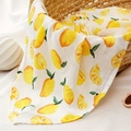 Soft muslin cotton baby blanket with vibrant lemon pattern displayed in a wicker basket - Smt098-s19 / 120*110
