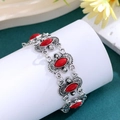 Detail of bohemian silver alloy bracelet with red marquise stones and hollowed patterns - Marquise Style(A059) / Red