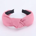 Detail of light pink top knot headband showing high-quality twill fabric texture - Pink