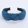 Minimalist wide fabric headband with a top knot design in deep peacock blue color - Ocean Blue