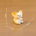 Miniature resin fennec fox figurine in warm yellow with blinking expression and 3cm size - No.1 Winking Style