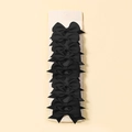 Set of 10 black grosgrain ribbon bow hair clips organized on a white paper display card - Black