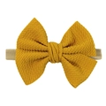 Elastic mustard yellow waffle bow headband for babies with soft nylon band - Mustard Yellow
